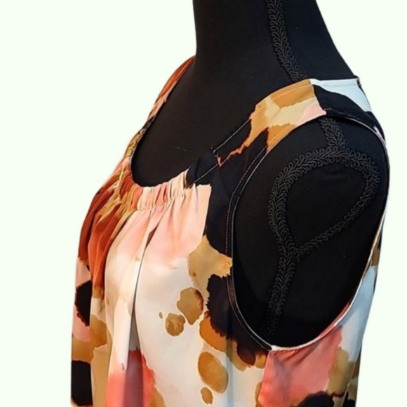 Chicos sleeveless silky top. Ivory, peach, and browns. Size 1. - Picture 4 of 4